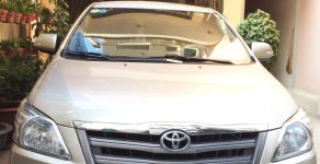 Toyota Innova E 2015 - Gia đình đổi xe cần bán Innova E 2015, màu ghi vàng giá 500 triệu tại Tp.HCM
