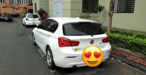 BMW 1 Series 118i 2015 - Bán BMW 118i sản xuất 2015 giá 880 triệu tại Tp.HCM