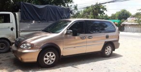 Kia Carnival   2009 - Bán xe cũ Kia Carnival 2009, màu nâu, 250tr giá 250 triệu tại Bình Dương