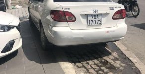 Toyota Corolla 2005 - Bán Toyota Corolla sản xuất 2005, màu trắng, xe đẹp hoàn hảo giá 295 triệu tại Tp.HCM