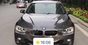 BMW 3 Series 320i 2012 - Cần bán lại xe BMW 3 Series 320i đời 2012, màu nâu, nhập khẩu nguyên chiếc   giá 768 triệu tại Tp.HCM