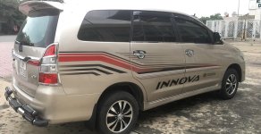 Toyota Innova E 2014 - Bán Toyota Innova E sản xuất 2014, màu vàng, giá chỉ 439 triệu giá 439 triệu tại Hà Nội