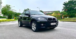 BMW X6 3.0 i 2010 - Cần bán xe BMW X6 3.0 đời 2010, màu đen, xe nhập giá 1 tỷ 286 tr tại Hà Nội