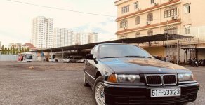 BMW 3 Series 320i 1995 - Bán BMW 320i sản xuất 1995, màu đen, nhập khẩu giá 120 triệu tại Tp.HCM