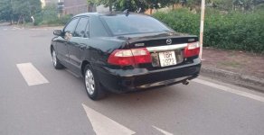 Mazda 626   2002 - Cần bán xe Mazda 626 sản xuất năm 2002, màu đen, 135tr giá 135 triệu tại Nam Định