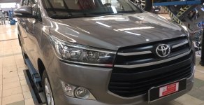 Toyota Innova E 2016 - Bán Innova 2.0E đăng ký 2017, màu đồng, máy xăng số sàn, giảm liền tay XXXX cho khách thiện chí giá 690 triệu tại Tp.HCM