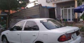 Mazda 323 1999 - Cần bán gấp Mazda 323 sản xuất năm 1999, màu trắng, nhập khẩu giá 90 triệu tại Vĩnh Long