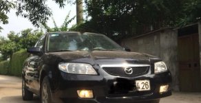 Mazda 323 Standard 2002 - Bán Mazda 323 Standard năm sản xuất 2002, màu đen  giá 105 triệu tại Hà Nội