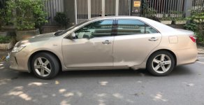 Toyota Camry Q 2016 - Bán Toyota Camry Q sản xuất năm 2016, màu vàng chính chủ, 935 triệu giá 935 triệu tại Hà Nội