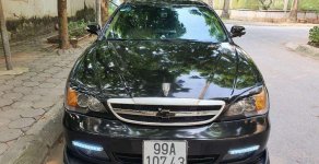 Daewoo Magnus 2004 - Bán Daewoo Magnus 2004, màu đen, full options giá 150 triệu tại Hà Nội