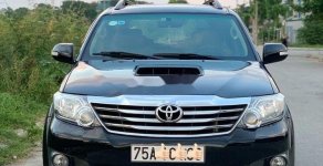 Toyota Fortuner 2014 - Chính chủ bán xe Toyota Fortuner đời 2014, màu đen giá 715 triệu tại TT - Huế