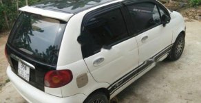 Daewoo Matiz SE 2003 - Cần bán lại xe Daewoo Matiz SE sản xuất năm 2003, màu trắng giá 50 triệu tại Thanh Hóa