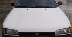Mazda 323 1995 - Cần bán lại xe Mazda 323 năm sản xuất 1995, màu trắng, xe nhập, giá cạnh tranh giá 60 triệu tại Quảng Nam