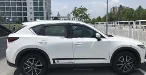 Mazda CX 5 2018 - Bán Mazda CX 5 sản xuất năm 2018, màu trắng, nhà xài kỹ, còn mới 98% giá 930 triệu tại Bình Dương