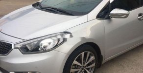 Kia K3     2014 - Cần bán gấp Kia K3 sản xuất năm 2014, màu bạc xe gia đình giá 475 triệu tại Đồng Nai