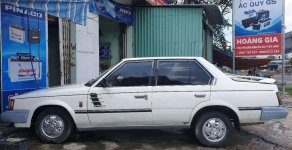 Toyota Corona   1984 - Cần bán lại xe Toyota Corona năm sản xuất 1984, màu trắng giá 16 triệu tại Tiền Giang