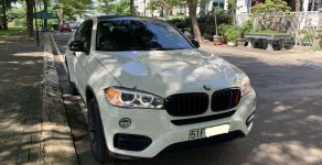 BMW X6     2014 - Cần bán xe BMW X6 đời 2014, màu trắng, nhập khẩu nguyên chiếc xe gia đình giá 2 tỷ 100 tr tại Tp.HCM