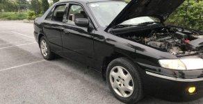 Mazda 626 2.0 MT 2000 - Bán ô tô Mazda 626 2.0 MT năm 2000, màu đen số sàn, giá tốt giá 148 triệu tại Tp.HCM