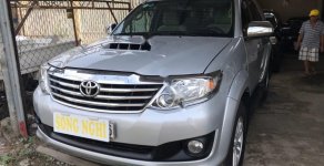 Toyota Fortuner 2014 - Cần bán xe Toyota Fortuner đời 2014, màu bạc xe nguyên bản giá 725 triệu tại Tiền Giang