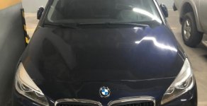 BMW 2 Series 218i Gran Tourer 2016 - Cần bán gấp BMW 2 Series 218i Gran Tourer năm 2016, màu xanh lam, nhập khẩu nguyên chiếc, giá chỉ 950 triệu giá 950 triệu tại Tp.HCM