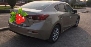 Mazda 3 2015 - Cần bán gấp Mazda 3 2015, màu nâu, 517 triệu xe còn mới nguyên giá 517 triệu tại Thanh Hóa