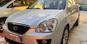 Kia Carens 2.0MT 2010 - Cần bán gấp Kia Carens 2.0MT đời 2010, màu bạc giá 290 triệu tại Bình Dương