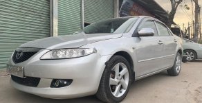 Mazda 6 2004 - Bán lại xe Mazda 6 đời 2004, màu bạc, số sàn, giá tốt giá 225 triệu tại Bình Dương
