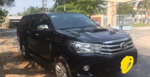 Toyota Hilux 2016 - Cần bán Toyota Hilux đời 2016, màu đen, xe nhập, giá tốt giá 590 triệu tại Đắk Lắk