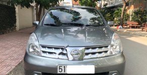 Nissan Grand livina 2011 - Cần bán Nissan Grand livina 1.8 AT 2011, màu xám, xe gia đình  giá 335 triệu tại Tp.HCM