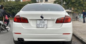 BMW 5 Series   2012 - Bán ô tô BMW 520i sản xuất 2012, màu trắng, xe nhập giá 975 triệu tại Hà Nội