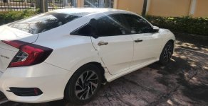 Honda Civic 1.8 E 2018 - Cần bán lại xe Honda Civic 1.8 E đời 2018, màu trắng, xe nhập  giá 720 triệu tại Thanh Hóa
