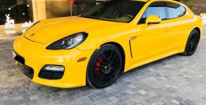 Porsche Panamera 3.6 V6 2010 - Cần bán xe Porsche Panamera 3.6 V6 sản xuất 2010, màu vàng, nhập khẩu giá 1 tỷ 850 tr tại Hà Nội