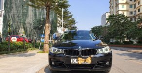 BMW 3 Series 328i GT 2014 - Cần bán BMW 3 Series 328i GT sản xuất năm 2014, màu đen, xe nhập giá 1 tỷ 150 tr tại Hà Nội