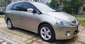 Mitsubishi Grandis 2.4 AT 2009 - Cần bán Mitsubishi Grandis 2.4 AT năm sản xuất 2009, màu vàng giá 415 triệu tại Hà Nội