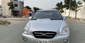 Kia Carens   MT 2009 - Bán ô tô Kia Carens MT đời 2009, màu bạc, giá chỉ 269 triệu giá 269 triệu tại Tp.HCM