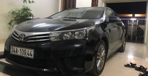 Toyota Corolla 2015 - Cần bán lại xe Toyota Corolla sản xuất năm 2015, màu đen xe gia đình, giá 519tr giá 519 triệu tại Hải Dương