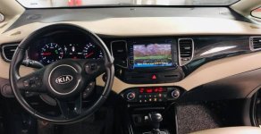 Kia Rondo 2015 - Cần bán lại xe Kia Rondo đời 2015, màu nâu số tự động, giá tốt giá 586 triệu tại Tp.HCM