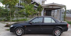 Mazda 323   2003 - Cần bán lại xe Mazda 323 sản xuất 2003, màu đen, giá tốt giá 129 triệu tại Ninh Bình
