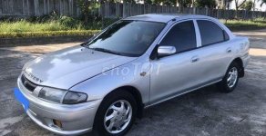 Mazda 323   2000 - Cần bán gấp Mazda 323 sản xuất năm 2000, màu bạc giá 95 triệu tại Cần Thơ