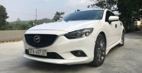 Mazda 6   2014 - Cần bán Mazda 6 sản xuất 2014, màu trắng, nhập khẩu   giá 609 triệu tại Nghệ An