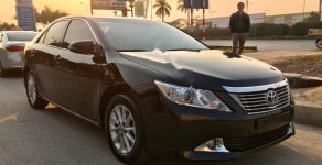 Toyota Camry   2013 - Cần bán lại xe cũ Toyota Camry 2.0E năm 2013, màu đen, giá 660tr giá 660 triệu tại Nam Định