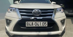 Toyota Fortuner   E   2018 - Cần bán lại xe Toyota Fortuner sản xuất 2018, màu kem (be) giá 1 tỷ 65 tr tại Tp.HCM