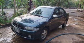 Mazda 323 2000 - Cần bán gấp Mazda 323 đời 2000, màu xanh lam giá 93 triệu tại Đồng Nai