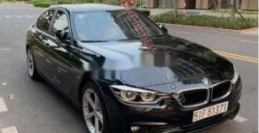 BMW 3 Series 2015 - Bán ô tô BMW 3 Series 320i sản xuất năm 2015, màu đen, xe nhập giá 995 triệu tại Tp.HCM
