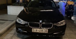 BMW 3 Series 320i 2013 - Cần bán lại xe BMW 3 Series 320i đời 2013, màu đen, xe nhập chính chủ giá 716 triệu tại Tp.HCM