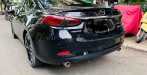 Mazda 5    2016 - Cần bán gấp Mazda 5 năm 2016, màu đen, giá 670tr giá 670 triệu tại Tp.HCM