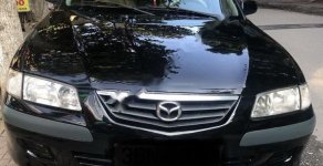 Mazda 626 2001 - Cần bán lại xe Mazda 626 đời 2001, màu đen số sàn giá cạnh tranh giá 184 triệu tại Ninh Bình