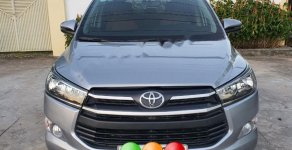 Toyota Innova 2.0E 2018 - Bán ô tô Toyota Innova 2.0E MT sản xuất 2018, màu xám như mới giá 599 triệu tại Hậu Giang