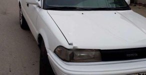 Cần bán lại xe Toyota Corolla sản xuất 1991, màu trắng, nhập khẩu nguyên chiếc giá 55 triệu tại Thanh Hóa