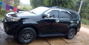 Toyota Fortuner 2.5G 2014 - Bán ô tô Toyota Fortuner 2.5G đời 2014, màu đen giá 740 triệu tại Nghệ An